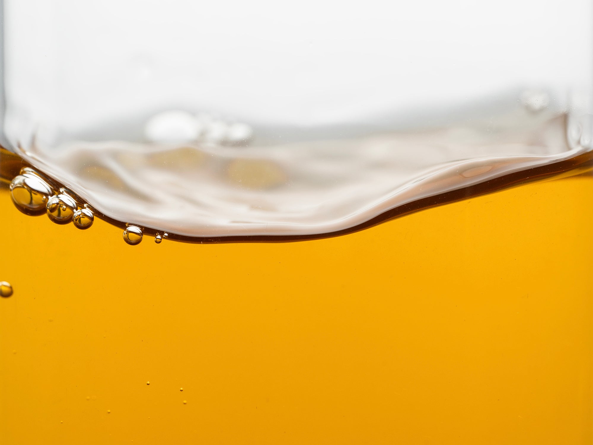 Clear apricot-yellow liquor of brewed Golden Sprout Yellow Tea